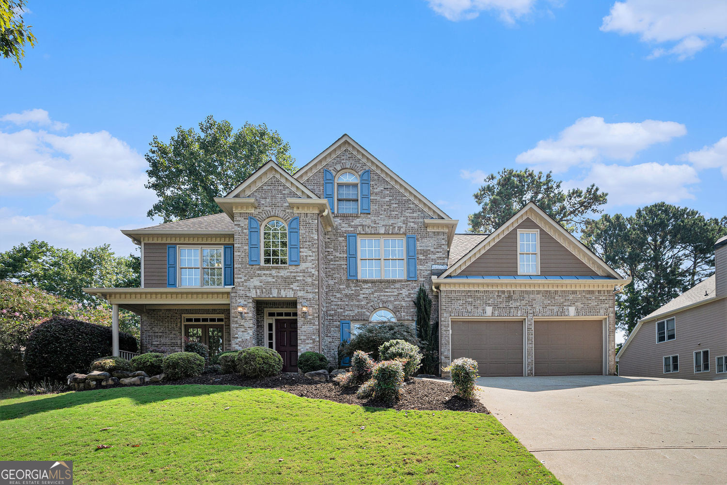 Stunning Golf Course Home in Bridgemill with Over 4,600 Sq Ft of Finished Living Space! Inside the Home: Step into a grand 2-story foyer flanked by a formal dining room on one side and a flexible formal living room/office on the other. The solid hardwood floors throughout the main level have just been refinished and shine beautifully. Enjoy morning coffee or an evening glass of wine on your private deck, taking in serene views of the golf course and surrounding landscape. Upstairs Features: Oversized primary suite with a private office/sitting area, spa-like en-suite bath featuring heated floors and custom stained glass window, two large walk-in closets, including a custom closet system in one. Finished Basement Highlights: in-law suite with built-in sauna for ultimate relaxation, full second kitchen with built-in oven & microwave, dishwasher, refrigerator, sink, and custom cabinetry, wall-mounted TV and sound bar (included!), and room to entertain, second laundry area, and multiple storage rooms. There is a secret hidden room behind the bookcase with a large safe that stays with the home-perfect for valuables. This home truly has it all: space, luxury, privacy, and an ideal location. Welcome to your dream home in the highly sought-after Bridgemill community, where optional Athletic Memberships offer resort-style living at its finest! Enjoy access to top-tier amenities including: tennis & pickleball courts, a 2-acre aquatic center with waterslides, lap lanes, and water volleyball, an 18-hole golf course (this home overlooks the 6th hole!), basketball and sand volleyball courts, a full gym, playground, and more. All this, with close proximity to Publix, shopping, medical facilities, top-rated schools, Canton, Woodstock, and I-575-making this an unbeatable location. Don't miss your chance to make this one-of-a-kind Bridgemill home your own. Schedule a private tour today!