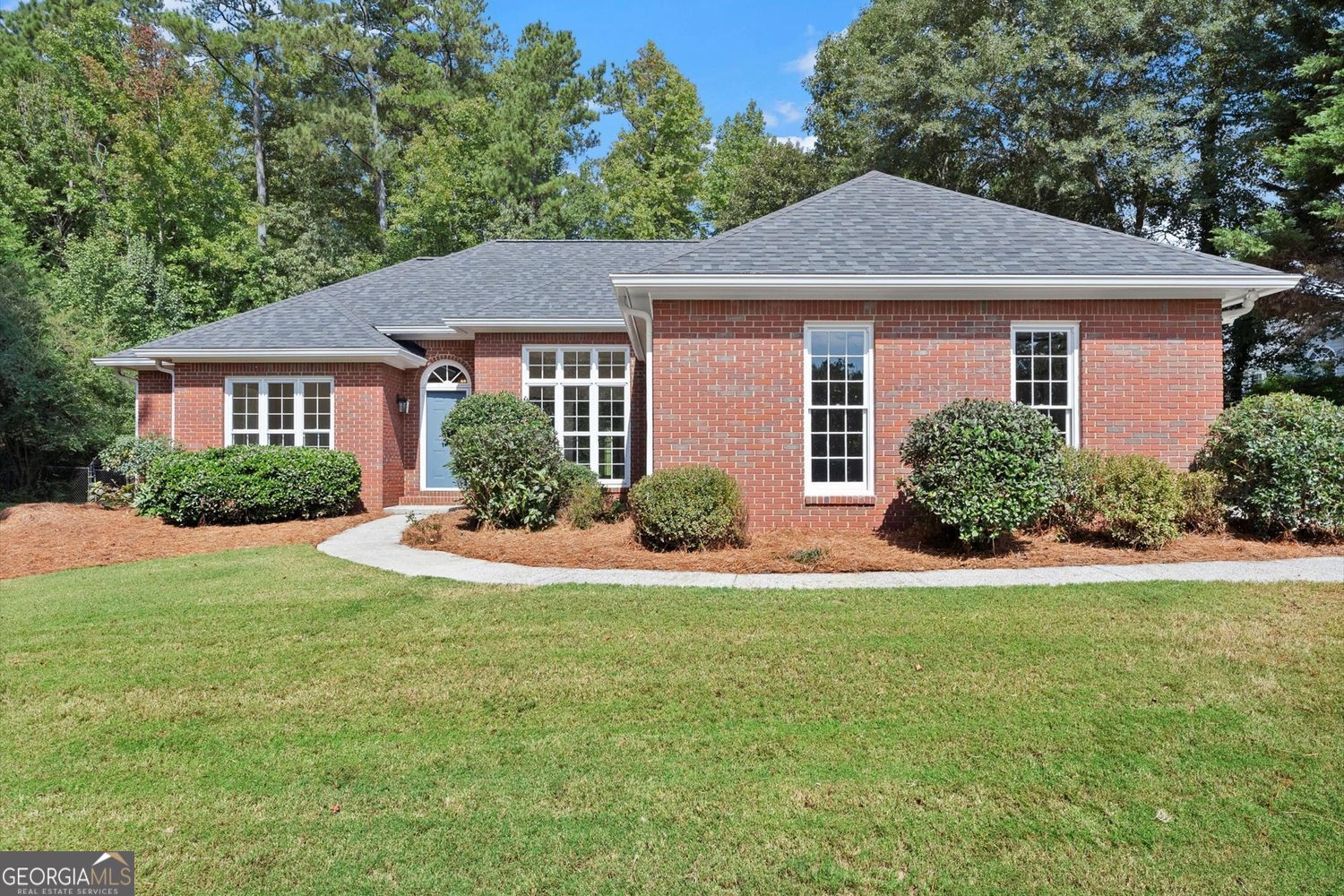 Welcome to 1620 Greystone Road in Cumming, GA, a beautifully updated ranch home set on over three-quarters of an acre in the sought-after Greystone Forest community. Combining timeless design with modern upgrades, this residence offers effortless living just five minutes from downtown Cumming. Recent enhancements include a brand-new roof, new flooring throughout, fresh interior paint, storm windows, professional landscaping, and a newly renovated primary bath. The single-level layout features 4 bedrooms and 2 baths, with the primary suite on main serving as a true retreat. Enjoy a spa-like bath with a soaking tub, double vanity, and walk-in closet. The home also includes a formal dining room, bright breakfast area with bay windows, and a large laundry room for added convenience. A 2-car garage offers functionality, while the freshly landscaped grounds and wide lot provide welcoming curb appeal. Outdoors, the flat, fully fenced yard offers privacy and opportunity, with ample space for a pool, garden, or future outdoor additions. Nestled in a quiet neighborhood with no HOA and away from busy streets, this home provides the rare combination of tranquility and accessibility. Enjoy close proximity to Lake Lanier, GA-400, shopping, dining, and all that North Georgia has to offer.