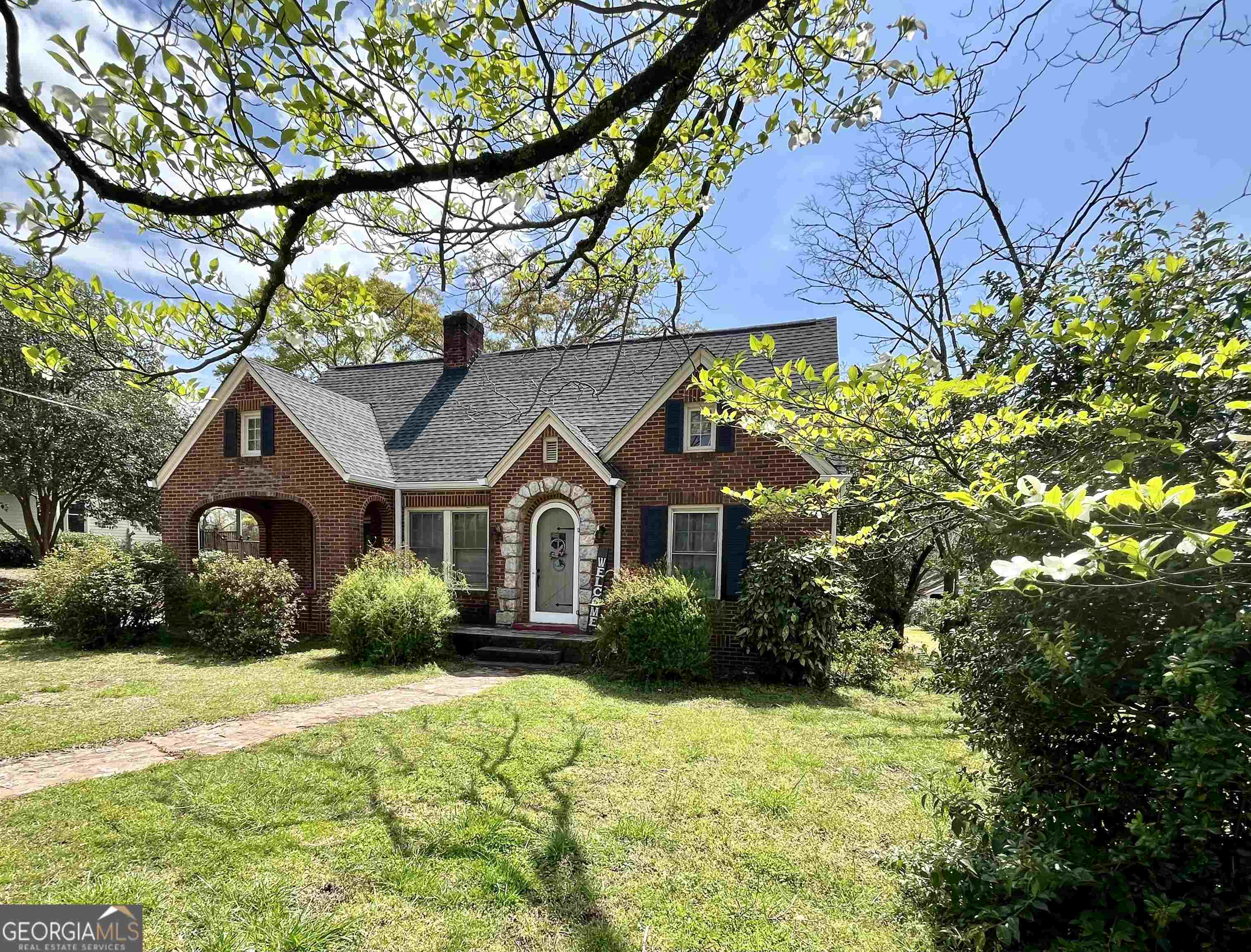Coming soon! Charming 3-bedroom & 1-bathroom 4-sided brick ranch home that was built in 1936 resting on a 1 acre +/- lot just outside the Monticello Square. This home features a brand-new roof & gutters, new paint inside and out, the original wood floors, curved hallway, new floors in the bathroom, high ceilings, 4-fireplaces, separate large family/living room, dining room, mud room and kitchen. The back yard is private with plenty of parking, a new deck, plenty of green grass and privacy. The property is being sold "as is".