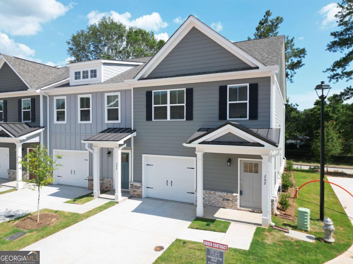Don't miss your chance to be the very first to live in these brand-new end-unit townhomes at Mill Creek Park! Two stunning homes, Units 202 and 216, are ready for move-in just minutes from downtown Athens and the University of Georgia. Each 3-bedroom, 2.5-bath home features a thoughtfully designed open floor plan with modern finishes throughout. Enjoy luxury vinyl plank flooring, tall ceilings, and abundant natural light. The kitchen is equipped with stainless steel appliances, granite countertops, a breakfast bar, and plenty of cabinetry-perfect for everyday living and entertaining. Upstairs, the primary suite offers a spacious walk-in closet and a private bath with a sleek walk-in shower. Two secondary bedrooms and a full bath provide flexibility for guests, family, or a home office. Each home also includes a one-car garage and driveway parking. Lease terms range from 12 to 36 months. As end units, both homes offer enhanced privacy and extra windows for even more natural light. Contact listing agent Hank Bailey at 706-621-1895 for details!