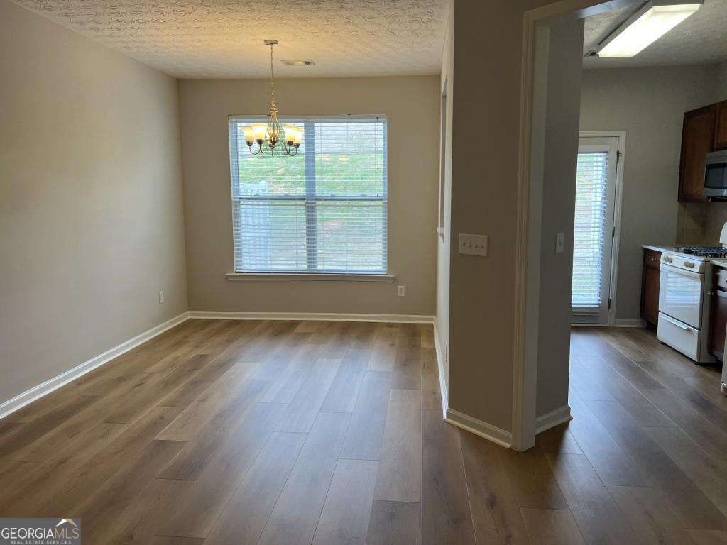 Photo of 6614 Splashwater Drive, Flowery Branch, GA 30542 (MLS # 10660415)