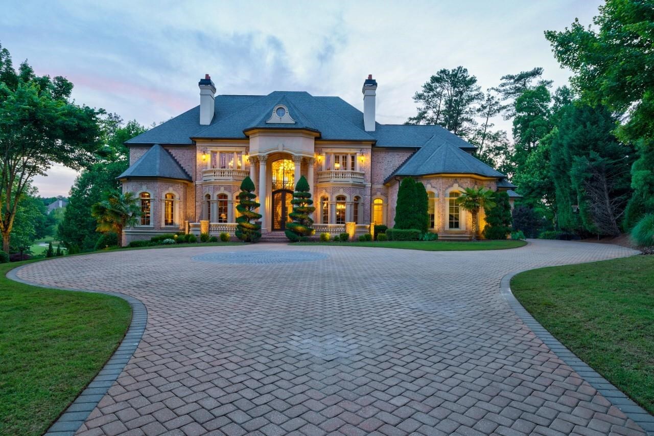 Exquisite design & luxury are uniquely embodied in this spectacular custom Master's Construction Sugarloaf Country Club estate. Every detail was carefully selected & quality crafted for unparalleled luxurious living. This fabulous estate features 7 private bedroom suites w/en-suite baths, open floor plan for entertaining, walnut flooring, magnificent ceilings, a 2-story mahogany study, Control4 smart home entertainment system & so much more. Enjoy time entertaining friends & family, in this resort-like backyard oasis, that overlooks prestigious TPC Sugarloaf golf course. The stunning kitchen is a modern chef's dream incl floor-ceiling cabinetry, a Sub-Zero refrigerator, Wolf appliances, along w/a 17' granite countertop for all gatherings. The adjacent, spacious great room boasts 25' tall ceilings & incredible windows overlooking one of the two covered outdoor decks. The large owner's suite w/views of the 8th and 9th holes, hosts one of the home's 7 fireplaces flanked by French doors leading to the captivating travertine tiled balcony. The owner's bath adds to the elegant spa like atmosphere including a 12' walk in shower surrounding a large Jacuzzi style tub. The owner's closet is adorned with cherry and glass cabinetry to hold all of your exquisite personal items. The custom-designed open terrace level incl a wine cellar, theater, exercise room, and a chef's kitchen with a 40' grand bar as its focal point. Outdoor living features over 5,000 sqft of beautiful paver decking that surrounds a 120,000-gallon custom-built infinity-edge swimming pool. Terrace level hosts covered patio along w/a full outdoor chef's kitchen & fireplace, capping off the ultimate in outdoor living experience. The details are endless in this one-of-a-kind masterpiece!