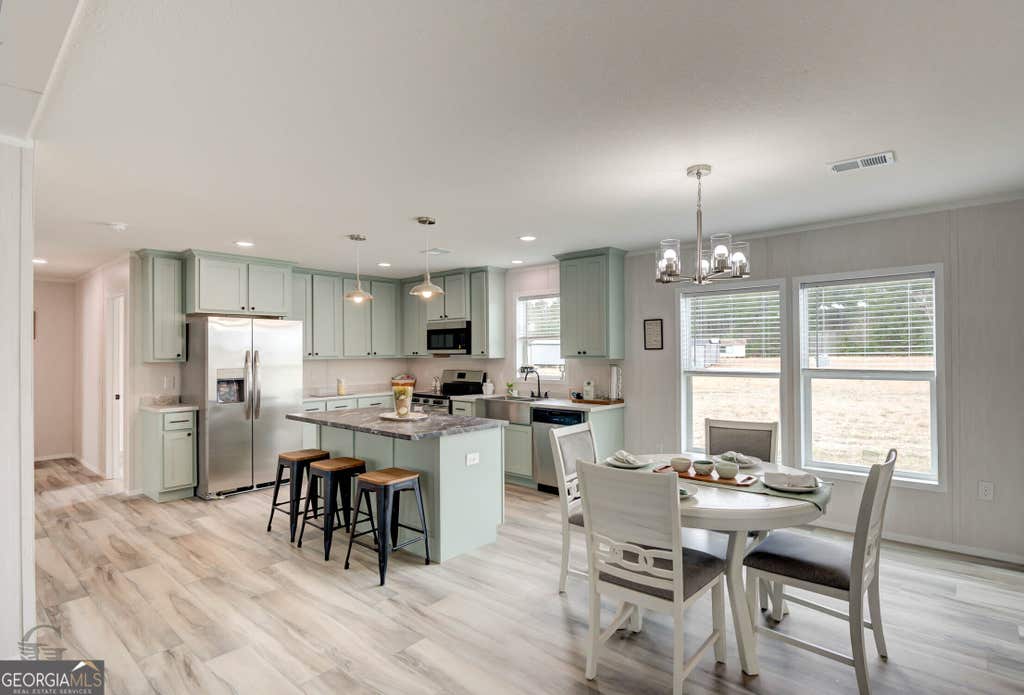 Photo of 109 Stewart Avenue NE, Milledgeville, GA 31061 (MLS # 10831339)