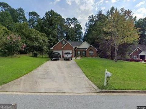 Photo of 65 FAIRWINDS Dr, Covington, GA 30016 (MLS # 10657780)