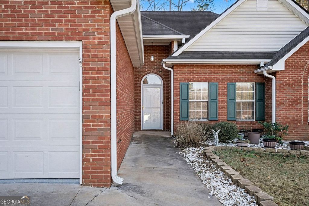 Photo of 65 FAIRWINDS Drive, Covington, GA 30016 (MLS # 10657780)