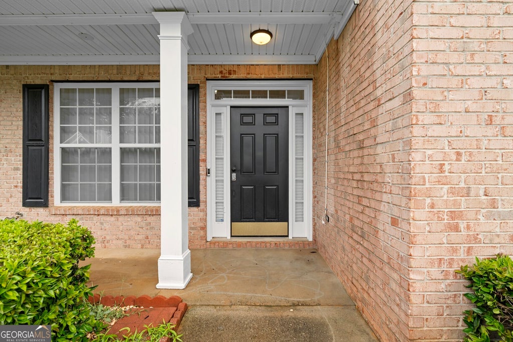 Photo of 2050 Wildcat Cliffs Way, Lawrenceville, GA 30043 (MLS # 10806830)