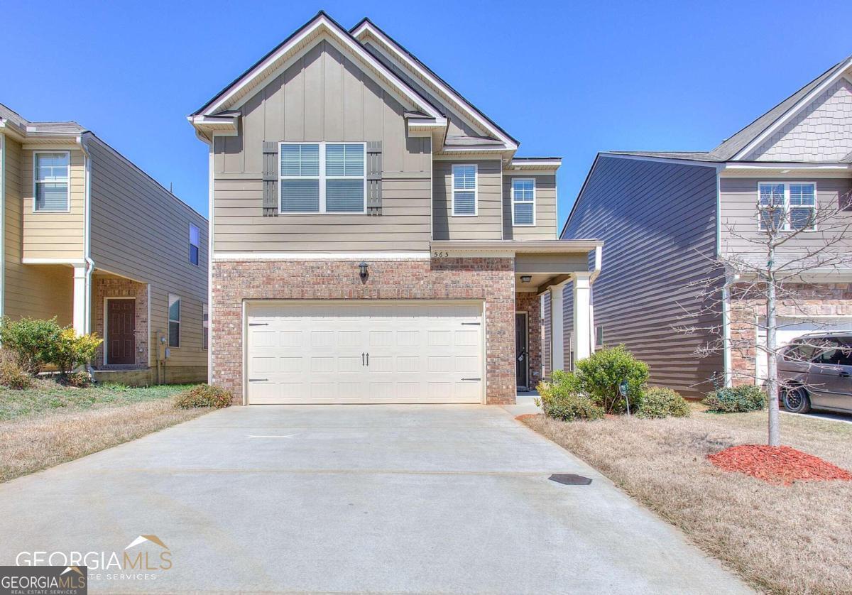Welcome home to this 5 years young beautifully constructed 3 bedroom, 2.5 Bathroom traditional-styled home. Complete with 2-car garage, this home features open concept living with extended granite countertops in the kitchen overlooking the family room, solid black appliances, and a 5 burner gas stove with combination microwave. The living room features rich espresso-colored hardwood flooring, electric fireplace with an easy on/off switch, and plenty of natural light pouring in from the windows. Upstairs you have 3 bedrooms, and oversized owner's suite, and walk-in closet. Not to mention a glass shower, double vanity with lots of windows pouring in the natural light. Outside, you'd have the pleasure to enjoy a sizable backyard with wrapped around privacy fence to enjoy quietly, or while entertaining family and friends.