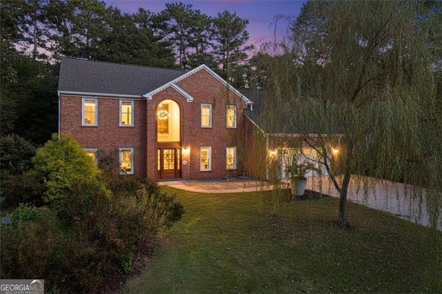 Welcome to 2372 Battle Forest Drive - Where Classic Elegance Meets Everyday Modern Comfort Prepare to fall in love with this meticulously maintained home, perfectly nestled on a level lot in a quiet cul-de-sac in the highly sought-after, well-established neighborhood of Battle Forest. This exquisite, turn-key residence offers a rare opportunity to own a luxurious private retreat-right in the heart of it all. Zoned for the award-winning Kennesaw Mountain High School and located less than five minutes from Historic Marietta Square and Kennesaw Mountain National Battlefield Park, this spacious 4-bedroom, 3-bath home is packed with thoughtful upgrades. It features a brand-new roof, fresh interior and exterior paint, custom cabinetry throughout, and a private backyard oasis with an above-ground X2000 SwimCross & Spa. A large Covered Deck, fully fenced and uniquely surrounded by Mature Bamboo, creates a peaceful escape from the hustle and bustle of daily life.  Step into the impressive two-story foyer, where natural light pours in through a grand custom arched window, highlighting the gleaming hardwood floors and floor-to-ceiling picture windows. Two sets of double French doors provide seamless access from the family and breakfast room to the backyard, creating a natural flow between indoor and outdoor living. A unique two-sided fireplace adds warmth and ambiance to both the family room and adjacent breakfast room while enjoying the views of your private oasis. Entertain in the formal dining room or enjoy casual meals in the spacious eat-in kitchen - ideal for relaxed mornings with family and full views of your private retreat. The versatile sitting room, bathed in natural light, can easily function as a home office, playroom, or cozy at-home lounge. At the end of the day, retreat to the luxurious master suite, complete with a second fireplace, custom California Closets, and an oversized spa shower with dual showerheads, a built-in bench, and a built-in sauna system that reaches up to 120 degrees-the ultimate in-home spa experience. The suite also includes a double vanity, offering both comfort and convenience. Upstairs, the hall bathroom has been upgraded with a second double vanity, providing added functionality for family and guests. Outside, enjoy hosting cookouts on the deck or relax in the heated X2000 SwimCross pool and spa, which is wired with its own electric system-ideal for those beautiful summer evenings or crisp fall nights under the stars. Located within walking distance to casual and fine dining, and just minutes from the shops and events of the Marietta Square, this home offers the perfect blend of quality, comfort, and convenience. Don't miss this rare opportunity to own a true gem in one of the area's most desirable neighborhoods!