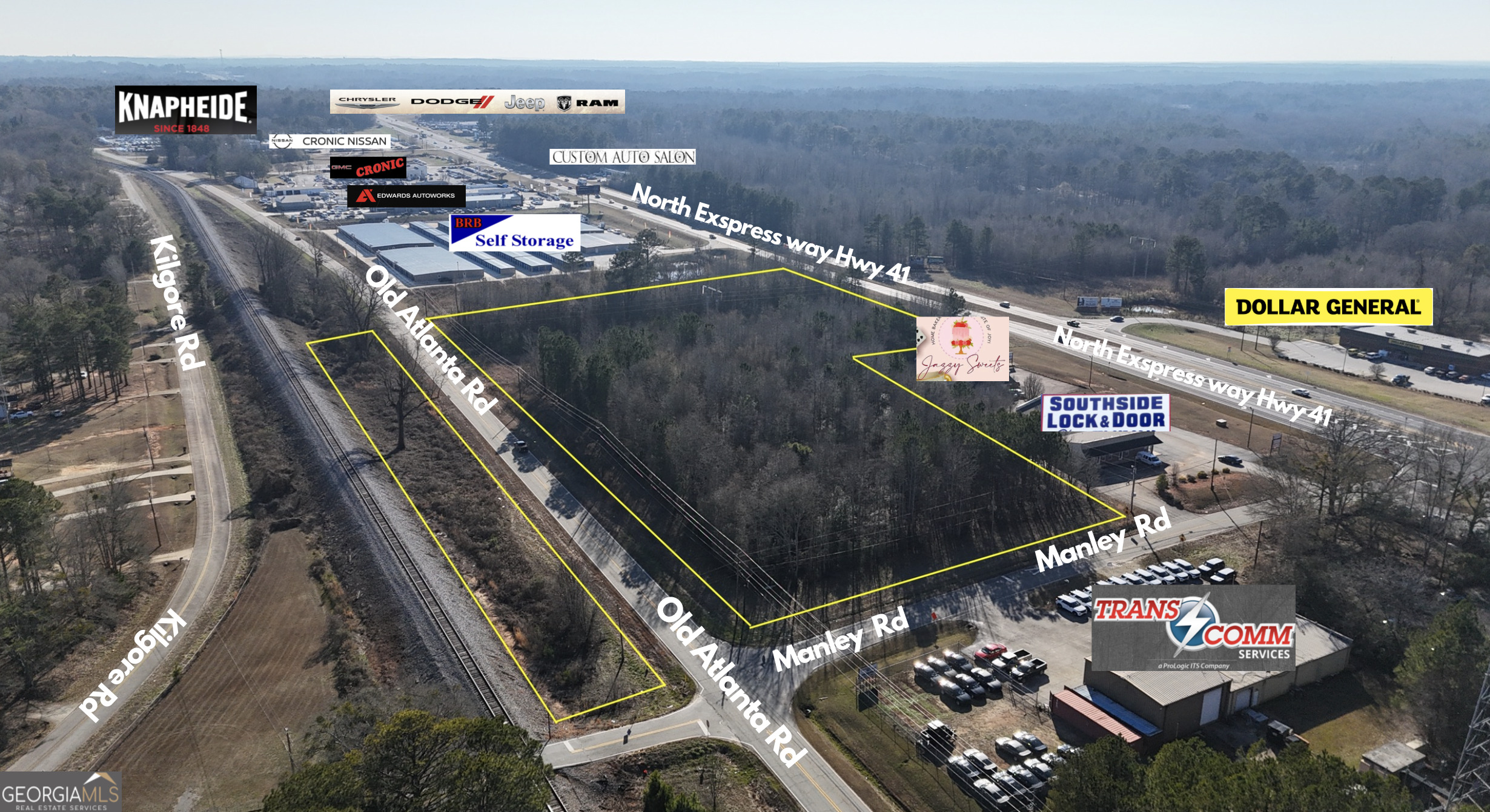 Prime Commercial Real Estate on 1941 North Expressway in Northern Spalding County. This exceptional property boasts an impressive 430 ft of road frontage on 1941 North Expressway, as well as 906 ft of Rd frontage on old Atlanta rd and 236 ft on Manley rd. With its sought-after C-1 Highway Commercial Zoning, this property is primed and ready for development according to your unique vision. Whether you envision a trendy restaurant, a charming bed and breakfast, or a bustling pawn shop, the possibilities are truly endless. Additionally, the adjacent C1-B zoning offers the potential for rezoning if desired. This property benefits from excellent visibility, with a high traffic count of 26,900 (VPD) vehicles per day on North expressway and 5,900 (VPD) vehicles per day on Old Atlanta Hwy. Don't miss out on this incredible opportunity to bring your commercial dreams to life.