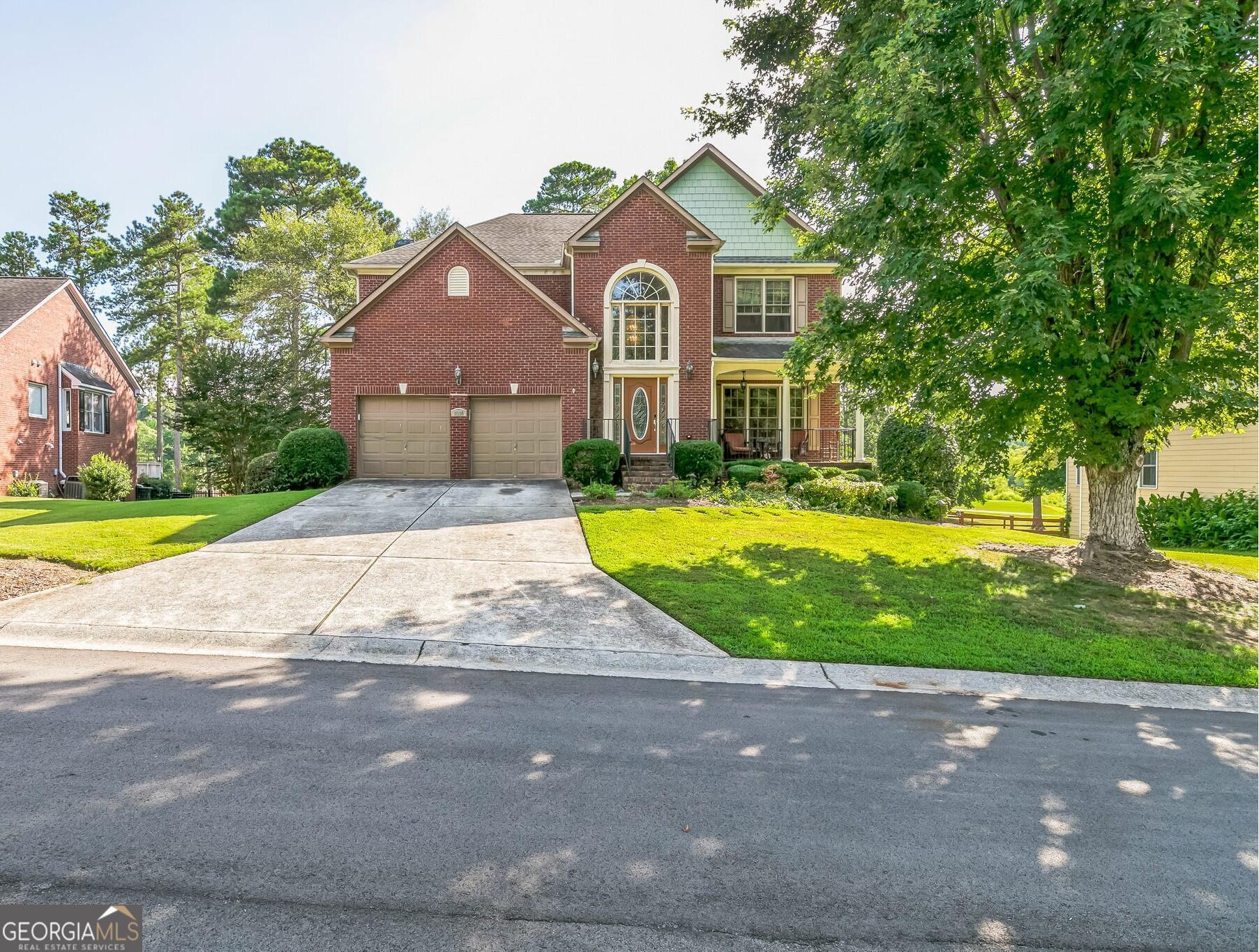 Live large near the lake in this stunning 3-story home in Villa Rica, offering over 4,400 sq ft of flexible living space, including a fully finished basement. With 5 bedrooms, 5 bathrooms, and a lower-level retreat featuring a bar, theater room, kitchenette, and bonus areas, there's room for everyone to relax and entertain. Enjoy the convenience of a 2-car garage with separate doors, public water and sewer, and a full irrigation system. Nestled in a peaceful community just minutes from Lake Tara and the vibrant shops and restaurants of downtown Villa Rica, this home blends comfort, space, and lifestyle-don't miss your chance to make it yours.