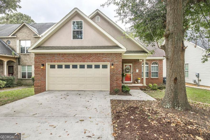 Step inside and fall in love with this warm and inviting 4 BR, 2.5 BA home that has been beautifully maintained and is move in ready. The cozy living room features a double-sided fireplace with gas logs, creating a perfect spot to relax or entertain. The kitchen is the heart of the home with a breakfast bar, pantry and newer appliances remaining - everything you need for easy everyday living. Enjoy meals in the separate dining area, just right for family dinners or gatherings with friends. The primary suite on the main level offers a peaceful retreat with a walk-in closet and a private bath featuring a double vanity, separate shower and relaxing garden tub. Upstairs, you'll find a spacious loft which is a great spot for a media room, office, second living space or play area. There's also three additional bedrooms with walk-in closets and a full bath. Enjoy outdoor living with a large covered deck overlooking the fenced back yard that's ideal for furry family members, play or entertaining. A two car garage adds extra convenience and storage. Recent updates include fresh interior paint, two new HVAC units (2024), and a new water heater. Located near shopping, dining and Robins Air Force Base, this home truly has it all - space, style and an unbeatable location. Come see for yourself - this one feels like home the moment you walk in! Call today to schedule your private showing.