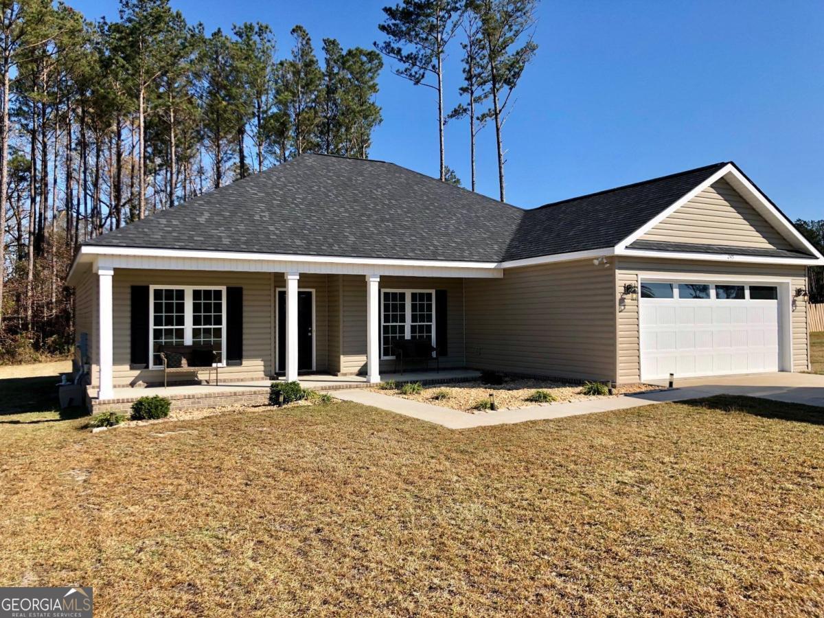 Make this oversized 3BR/2BA in the sought-after Leefield Preserve Community your new home! The open, split plan is the Preserve model, featuring 9' ceilings throughout with a 10' tray ceiling in the living room. Tucked in the back of the neighborhood, this home offers a gracioius, tranquil lifestyle. The 0.62ac lot features a tree-lined back yard complete with a swing set and patio furniture that convey with the sale. Move-in ready, this peaceful retreat is In the Brooklet Elementary / Southeast Bulloch school district. Call today to schedule your private tour!