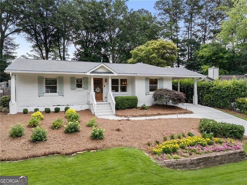 Set in the heart of Brookhaven's coveted Hillsdale neighborhood, this home blends the tree-lined charm and community feel of the area with stylish updates and an unbeatable location. The single-level design showcases an open floor plan filled with natural light, creating an effortless flow between living, dining, and kitchen spaces. Beautiful lighting throughout adds warmth and sophistication, while the marble-accented primary bath delivers a touch of luxury. Two spacious bedrooms anchor the home, and the third bedroom offers flexibility - perfect as a den, home office, or easily closed off as a private guest suite. Out back, a spectacular private yard takes center stage. Expansive and beautifully landscaped, it's the ultimate retreat for morning coffee on the patio, weekend barbecues, lawn games, or evenings under the stars. Outdoor living on this scale is a rare find in Hillsdale. All this just moments from Dresden's lively restaurants and shops, nearby parks, and top-rated schools - the best of Brookhaven living, wrapped in the timeless appeal of Hillsdale.