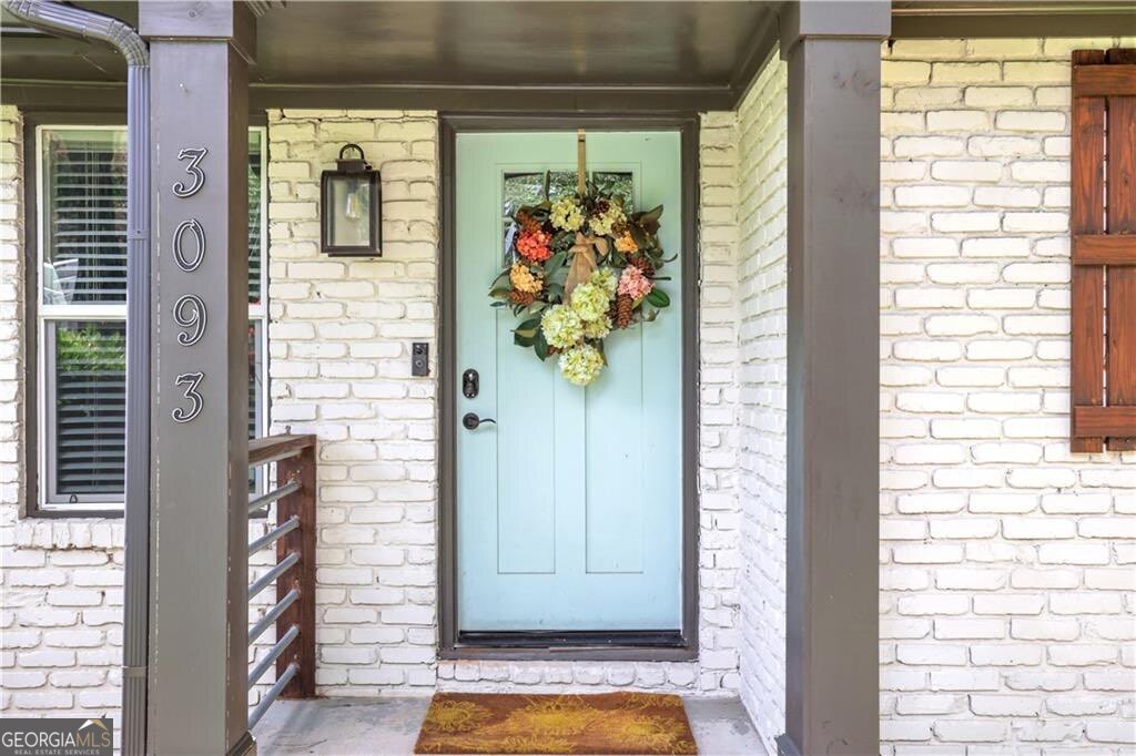 Searching for a charming brick home on a corner lot? You just found it. Welcome to 3093 Del Monico Dr-a lovingly maintained, classic all-brick ranch, perfectly situated on a generous corner lot in Decatur's Belvedere Park. Just moments from the highly anticipated Glenwood Soccer Park, a $3.1 million facility by Inter Atlanta FC, bringing new energy to the neighborhood, this home offers unbeatable value in a location that offers privacy and access. Step inside to fresh paint, three comfortable bedrooms, and two thoughtfully updated bathrooms-where classic charm meets everyday ease in a home that simply feels right. The flexible floorplan is the perfect option for first-time buyers or anyone looking to right-size into a comfortable, low-maintenance home. Enjoy the added bonus of a dedicated outdoor laundry closet, freeing up interior space while keeping everything functional and efficient. Filled with natural light and designed for easy living, this home is ideal for both relaxing and entertaining. Value priced and move-in ready, this is your chance to own a thoughtfully updated home in a vibrant, evolving community-steps from brand-new amenities and close to everything Decatur has to offer. Buyer incentive available! Ask about our closing cost credit. Schedule your showing today and make this HOME!