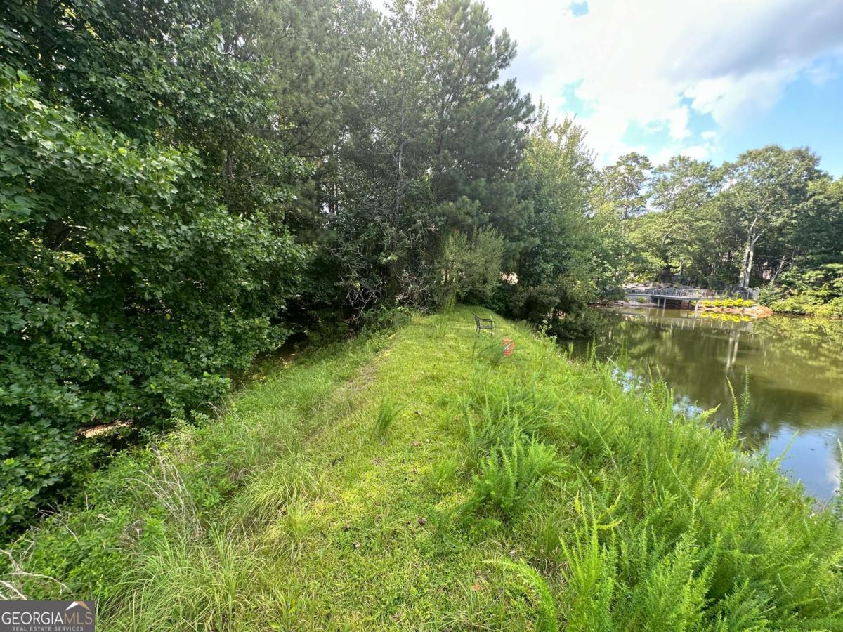 Don't miss this rare opportunity to own a beautiful lake view lot in a well-established and sought-after subdivision. This spacious parcel offers the perfect canvas for your dream home, with stunning views, mature surroundings, and convenient access to community amenities. Bring your plans and start building. This lot offers the peaceful setting and scenic beauty you've been searching for.