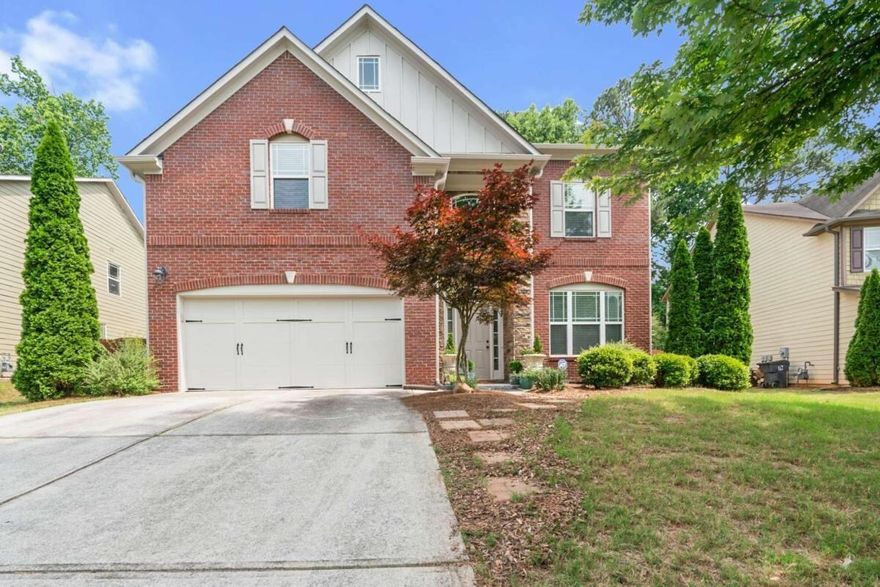 Welcome to the beautiful Oakland Trace neighborhood in Lawrenceville. Interior designer's dream home with neutral color palette. . This Craftsman style home has been well-loved and meticulously maintained by original owner for 12 years. Bright and open floor plan. Bedroom on the main level perfect for parent, guests or office. Enter this magnificent two story foyer and head back to the chef's kitchen featuring granite, tile backsplash, stained cabinets, hardwood floors, and the refrigerator remains. Bar area with built in cabinet next to dining room for entertaining.Upstairs laundry and washer/dryer remains with the home. Teen suite on the 3rd floor with additional storage space. Shed in back yard for storage. Garden already begun and ready to cook with. Private back yard perfect for entertaining. Easy access to Sugarloaf Pkwy, 316 and I-85. No rent restrictions and No HOA.