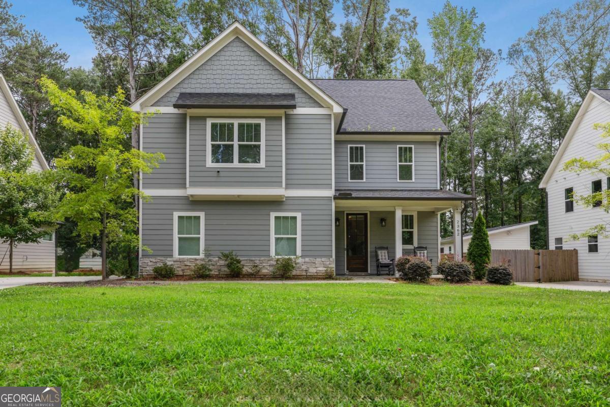 Welcome to this beautifully designed 4-bedroom, 3.5-bath home nestled in the desirable Browns Mill Community, where timeless Craftsman charm meets modern convenience. Perfectly situated in one of Atlanta's most vibrant and growing neighborhoods, this residence offers refined living with an open, airy floorplan and thoughtfully curated finishes. Gleaming hardwood floors flow throughout the main level, seamlessly connecting the spacious living area to a chef-inspired kitchen-complete with custom cabinetry, sleek countertops, and generous space for entertaining guests or enjoying quiet evenings at home. Upstairs, discover four oversized bedrooms, each designed for ultimate comfort and relaxation, including a serene primary suite with a spa-like ensuite bath and a generous walk-in closet. Enjoy the freedom of no HOA along with an unbeatable location-just steps from Browns Mill Golf Course and the scenic Atlanta Beltline. This prime setting offers effortless access to parks, walking trails, local dining, and vibrant city life. Plus, you're only minutes from Hartsfield-Jackson International Airport, as well as Intown Atlanta's premier shops, restaurants, and live entertainment venues, placing the best of the city right at your doorstep. With 100% financing and down payment assistance programs available, this is an extraordinary opportunity to own a modern masterpiece in the sought-after Browns Mill Community. Schedule your private tour today and experience the perfect blend of luxury, lifestyle, and location!