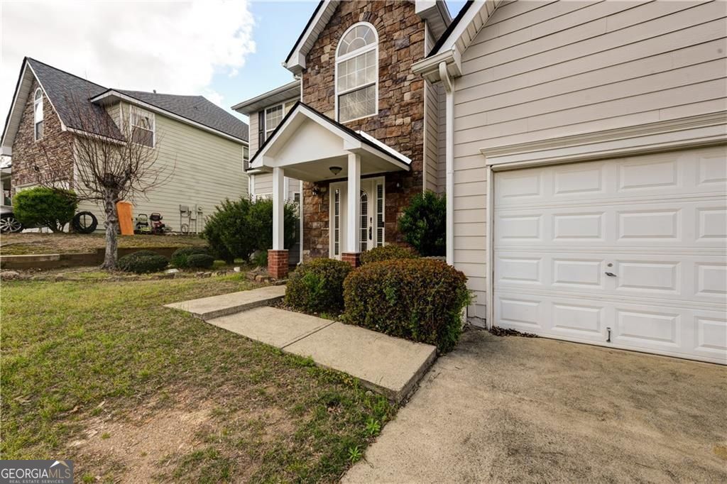 Photo of 635 Moonlight Way, Suwanee, GA 30024 (MLS # 10769973)