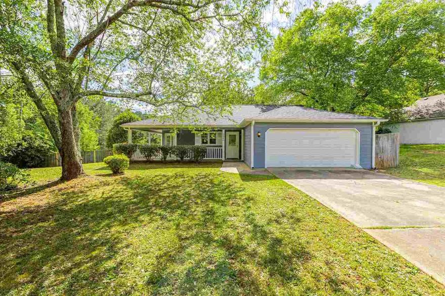 Welcome Home to this adorable 3BR | 2Bath Ranch with a Sprawling ½ Acre and a semi-wrap around porch! From the time you enter the home there’s a direct view to the super cozy family room featuring a brick fireplace and vaulted ceilings. Recently renovated kitchen showcases gorgeous granite countertops and tiled backsplash. Oversized master bedroom also has vaulted ceilings with a walk in closet.  Master bath features a garden tub and shower along with granite countertops. Just wait until you see the front porch and the backyard – that's one of our favorite highlights of this beautiful home!