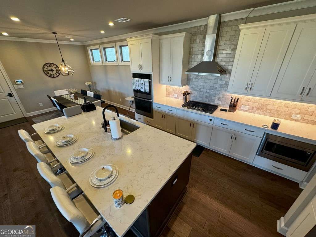 Photo of 610 Central Park Ovlk, Alpharetta, GA 30004 (MLS # 10711363)