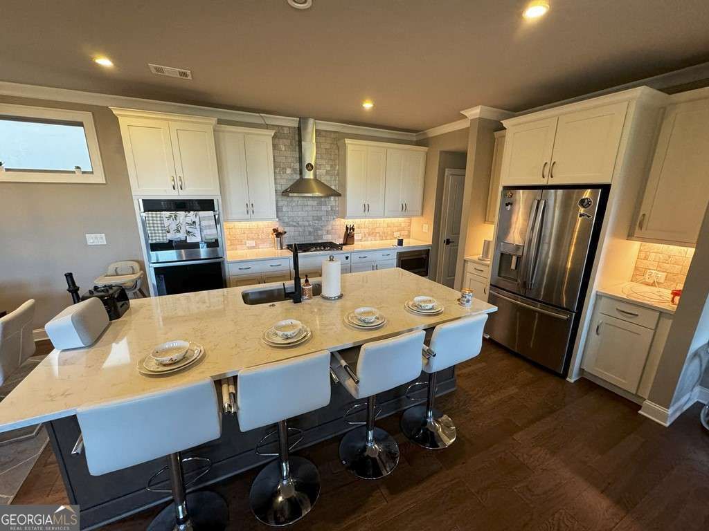 Photo of 610 Central Park Ovlk, Alpharetta, GA 30004 (MLS # 10711363)