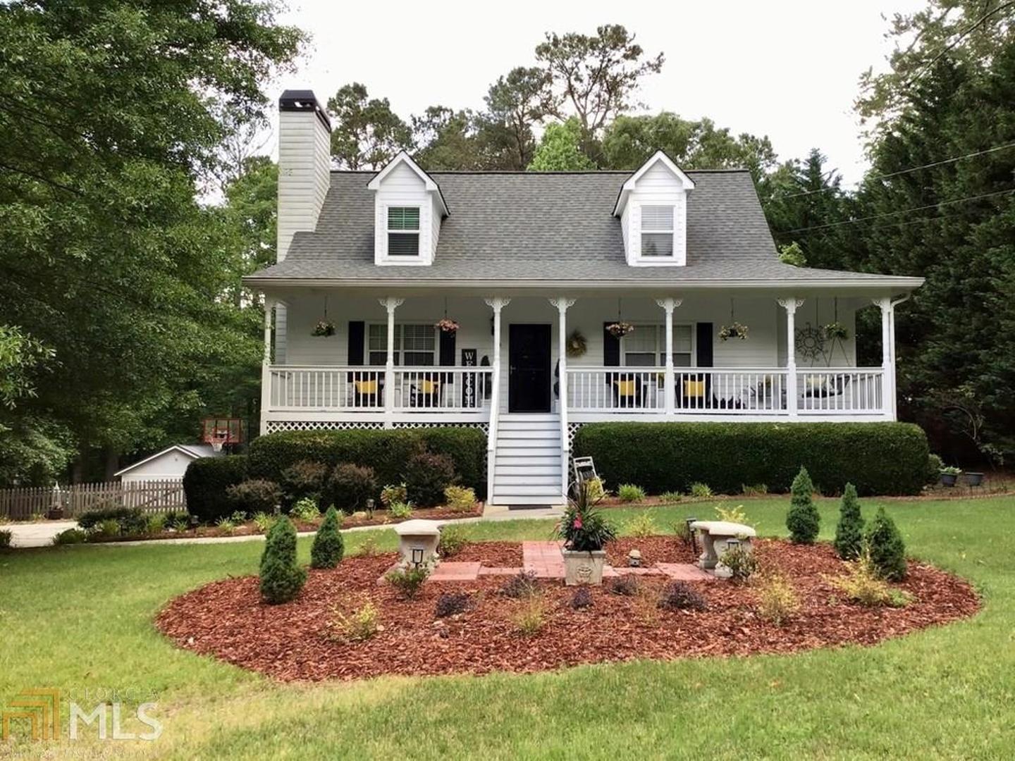 Imagine welcoming the start of your day with a refreshing beverage in a rocking chair on this Gorgeous front porch. This beautiful 3 BR/2 BA Country Style home sits in a quiet, well-established neighborhood. The Master is on the main with a full bath that offers a separate tub/shower. This home has a finished basement with a large laundry room connected. The private backyard is completely fenced and has a lovely screened in patio for entertaining family & friends! The landscaping brings in that added touch and is a sight to see. This house is priced to sell. Don't miss out on the opportunity to call this your home!!