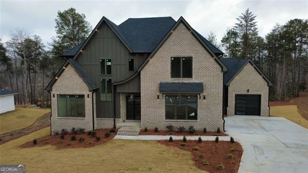 Photo of 6084 BLUEWATER Blvd, Gainesville, GA 30506 (MLS # 10656310)