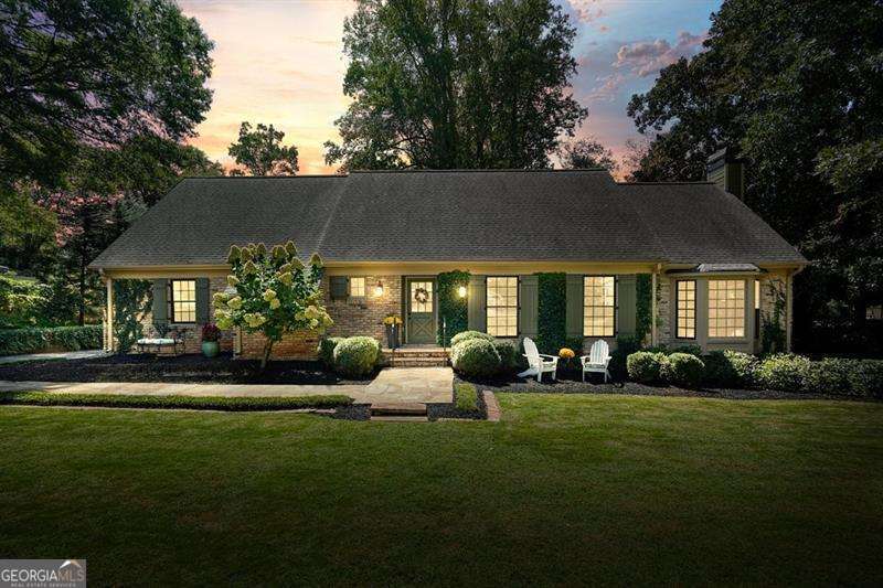 Timeless Cape Cod Charmer in Historic Marietta Welcome to 662 Bouldercrest Drive SW, a completely renovated 4-bedroom, 2.5-bath Cape Cod-style beauty in the highly desirable Whitlock Heights community. Just moments from the vibrant Marietta Square, Tumlin Park, and the coveted Marietta Center for Advanced Academics, this home offers the perfect blend of historic charm and modern updates. From the outside, the brick exterior, fresh paint, new landscaping, and fenced backyard set the stage. A two-car carport with a newly enclosed shed provides ample parking and storage. Inside, timeless character meets modern craftsmanship-crown molding, slate floors, 9-foot beamed ceilings, four fireplaces, and custom wood trim finishes around brand-new windows create a warm, inviting atmosphere. The primary suite is conveniently located on the main level, providing the ease of one-floor living. The spa-like bathroom features luxurious finishes, while the walk-in closets offer abundant storage-all beautifully designed for comfort and style. The heart of the home is the expansive kitchen and dining room combination. Completely remodeled, this breathtaking space is filled with natural light and finished in a modern cottage vibe that feels both elegant and welcoming. Perfect for gathering, cooking, and entertaining, it truly anchors the home. This residence has been renovated from top to bottom, with every major system and surface replaced brand new-including: Brand new windows throughout Two new HVAC systems & brand new water heater Fully updated electrical with new panel All new plumbing on main, new toilets, and fixtures Re-stained and repaired hardwoods on main level Remodeled chef's kitchen with new appliances Renovated baths and new upstairs flex space Waterproofed crawl space, stabilized foundation, new sod, fencing, and more The stone fireplace in the family room adds warmth and character, while the new back deck and flagstone patio with an outdoor wood-burning chimney extend the living space outdoors-perfect for alfresco dining and cozy gatherings. Upstairs you'll find three spacious bedrooms, all sharing a renovated hall bath with a double vanity. Off the third bedroom sits a walk-in closet, additional storage room, and a versatile flex space that can be used as a craft room, office, playroom, or more. Abundant walk-in attic storage ensures everything has a place. Originally built in 1964 on a .33-acre lot, this home perfectly balances history and modern convenience. With everything replaced brand new, this home is truly turnkey-ready for you to move right in. Location, charm, and a full renovation-this one is absolutely breathtaking. Don't miss your chance to call this Marietta treasure home!