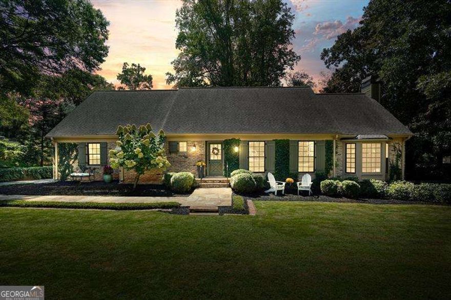 Timeless Cape Cod Charmer in Historic Marietta     Welcome to 662 Bouldercrest Drive SW, a completely renovated 4-bedroom, 2.5-bath Cape Cod-style beauty in the highly desirable Whitlock Heights community. Just moments from the vibrant Marietta Square, Tumlin Park, and the coveted Marietta Center for Advanced Academics, this home offers the perfect blend of historic charm and modern updates.    From the outside, the brick exterior, fresh paint, new landscaping, and fenced backyard set the stage. A two-car carport with a newly enclosed shed provides ample parking and storage. Inside, timeless character meets modern craftsmanship-crown molding, slate floors, 9-foot beamed ceilings, four fireplaces, and custom wood trim finishes around brand-new windows create a warm, inviting atmosphere.    The primary suite is conveniently located on the main level, providing the ease of one-floor living. The spa-like bathroom features luxurious finishes, while the walk-in closets offer abundant storage-all beautifully designed for comfort and style.    The heart of the home is the expansive kitchen and dining room combination. Completely remodeled, this breathtaking space is filled with natural light and finished in a modern cottage vibe that feels both elegant and welcoming. Perfect for gathering, cooking, and entertaining, it truly anchors the home.    This residence has been renovated from top to bottom, with every major system and surface replaced brand new-including:    Brand new windows throughout    Two new HVAC systems & brand new water heater    Fully updated electrical with new panel    All new plumbing on main, new toilets, and fixtures    Re-stained and repaired hardwoods on main level    Remodeled chef's kitchen with new appliances    Renovated baths and new upstairs flex space    Waterproofed crawl space, stabilized foundation, new sod, fencing, and more    The stone fireplace in the family room adds warmth and character, while the new back deck and flagstone patio with an outdoor wood-burning chimney extend the living space outdoors-perfect for alfresco dining and cozy gatherings.    Upstairs you'll find three spacious bedrooms, all sharing a renovated hall bath with a double vanity. Off the third bedroom sits a walk-in closet, additional storage room, and a versatile flex space that can be used as a craft room, office, playroom, or more. Abundant walk-in attic storage ensures everything has a place.    Originally built in 1964 on a .33-acre lot, this home perfectly balances history and modern convenience. With everything replaced brand new, this home is truly turnkey-ready for you to move right in.     Location, charm, and a full renovation-this one is absolutely breathtaking. Don't miss your chance to call this Marietta treasure home!