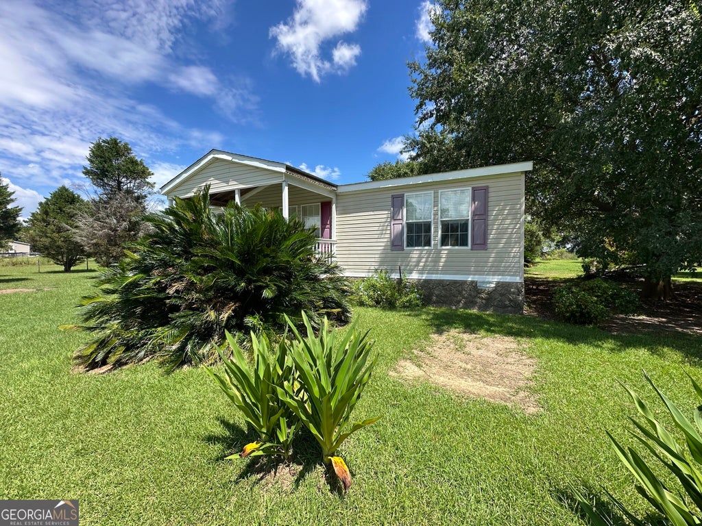 Photo of 450 Coy Cox Road, Omega, GA 31775 (MLS # 10841593)