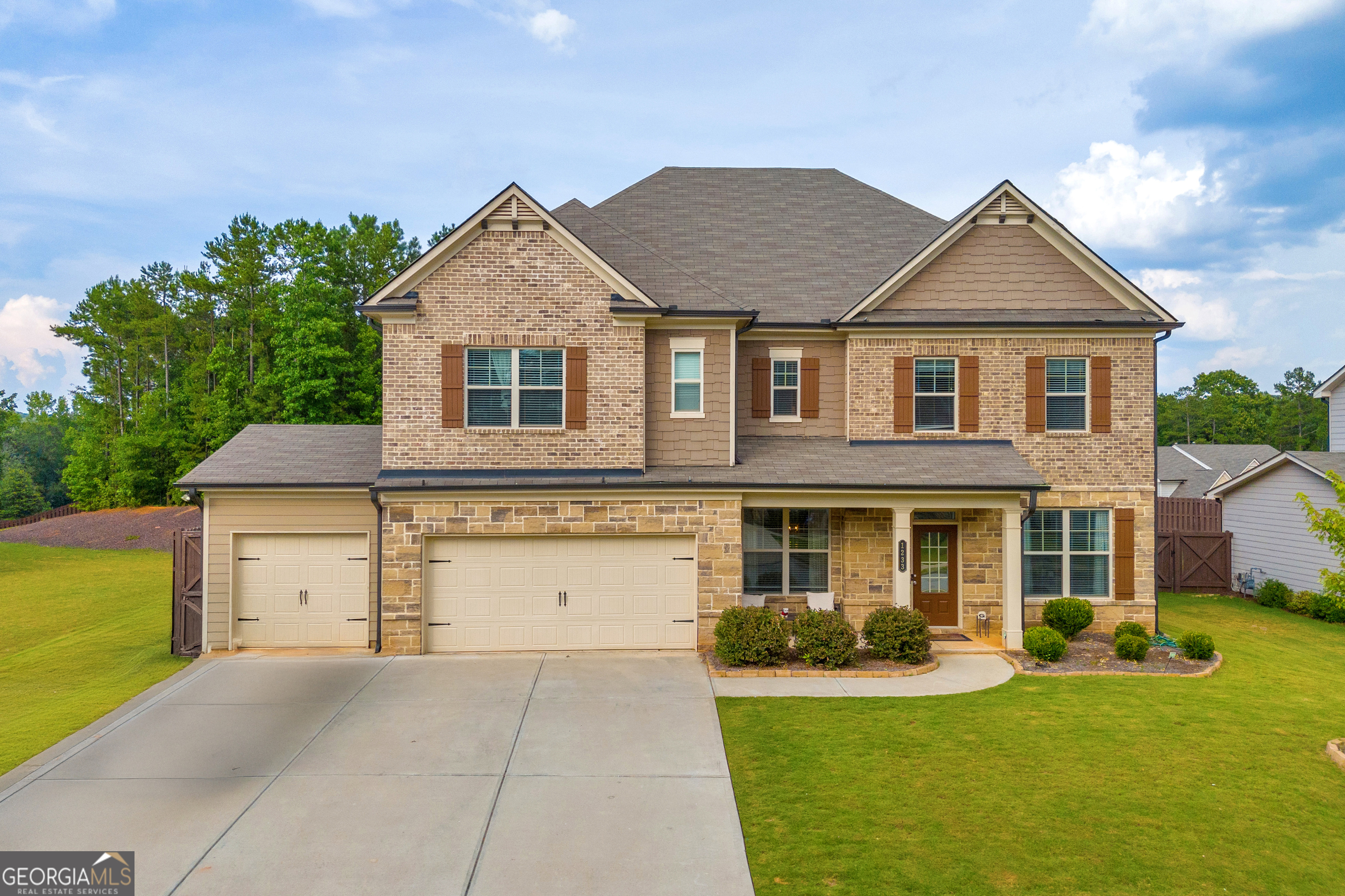 Exceptional home in the highly desirable Jefferson City Schools district, loaded with luxury upgrades and thoughtful design! This 4BR/3BA beauty features fresh paint and upgraded flooring. The main level includes a spacious guest suite, formal dining room, and a private office, ideal for today's lifestyle. The open concept kitchen is a showstopper with a shiplap accented center island, bar seating, and seamless flow into the living area. Custom shiplap details continue up the stairwell walls, adding warmth and charm. Upstairs, you'll find a versatile loft perfect for a second living space, playroom, or media area. The oversized owner's suite includes a spa-style shower with dual shower heads and a massive walk-in closet. Outside, enjoy an extended patio and fully fenced backyard. Perfect for entertaining or relaxing. Located in a swim/playground community with two pools and a playground, this home offers the total package. Ask about available $3,500 lender credit with preferred lender!