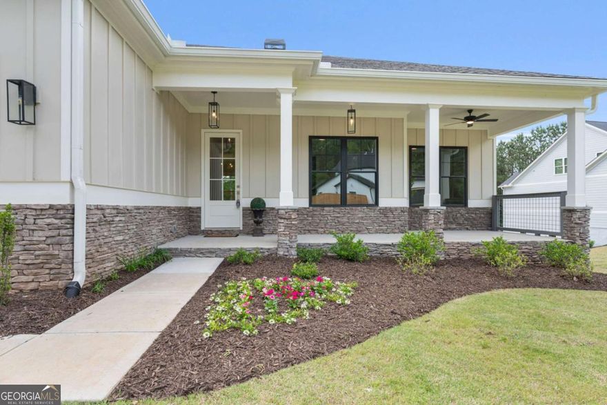ASK ABOUT OUR $15,000 "USE IT YOUR WAY" BUYER INCENTIVE!  NEW CONSTRUCTION * FULL DAYLIGHT BASEMENT * NO HOA * FORSYTH COUNTY  Experience the perfect blend of luxury, comfort, and privacy in this brand-new 4BR/2.5BA ranch-style home by award-winning Callaway Builders, ideally situated on a fully usable 0.63-acre homesite.  The sought-after Ranch Plan showcases refined main-level living, featuring gleaming quartz countertops, premium Bosch appliances, and a light-filled eat-in kitchen framed by serene tree views. Designed for effortless living, this layout suits singles, couples, young families, or empty nesters ready to "right-size" without compromise.  Below, the 2,433 sq ft walk-out daylight basement expands your possibilities-complete with a built-in safe room/storm shelter and space to create your dream rec area, home gym, or additional living quarters. The peaceful wooded backyard offers full ownership of a significant tree buffer, providing both privacy and nature's backdrop-plus ample space to add a fence, RV/boat parking pad, or pool.  Location Highlights:  * Walk to Young Deer Park & Lake Lanier  * Minutes to Hammonds Crossing, Cumming City Center, Marketplace Blvd Shopping, "The Crossing" at Coal Mountain and Gainesville Shopping  * Quick & easy access to GA 400  Enjoy modern convenience in a quiet, private setting-just moments from the lake. Don't miss this rare new construction opportunity where quality craftsmanship meets timeless design.