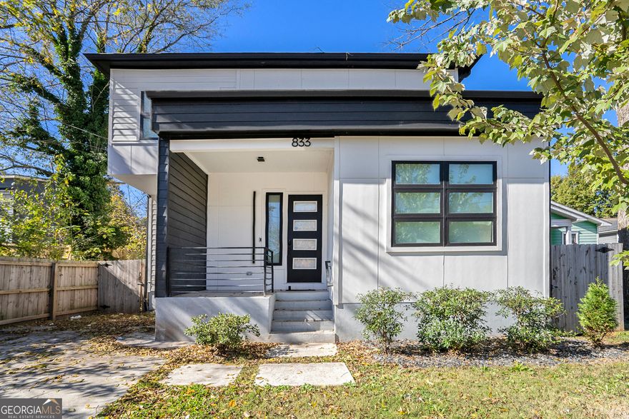 Welcome to this beautifully designed 4-bedroom, 3-bath home in the vibrant and fast-growing Pittsburgh neighborhood. Thoughtfully built for modern living, this home combines contemporary style with everyday comfort. Step inside to an airy open-concept layout filled with natural light, high ceilings, and wide-plank hardwood floors throughout. The chef's kitchen shines with sleek cabinetry, stone countertops, a gas range, and a picture-frame window overlooking the private, fenced backyard-perfect for entertaining or relaxing at home. The primary suite offers a peaceful retreat with balcony access, a walk-in closet, and a spa-inspired bath. Additional bedrooms provide ample space for family, guests, or a home office. Enjoy outdoor living or take advantage of nearby favorites like the BeltLine, Lee + White, Summerhill, and Peoplestown. Modern design, community charm, and city convenience come together beautifully in this stunning home.