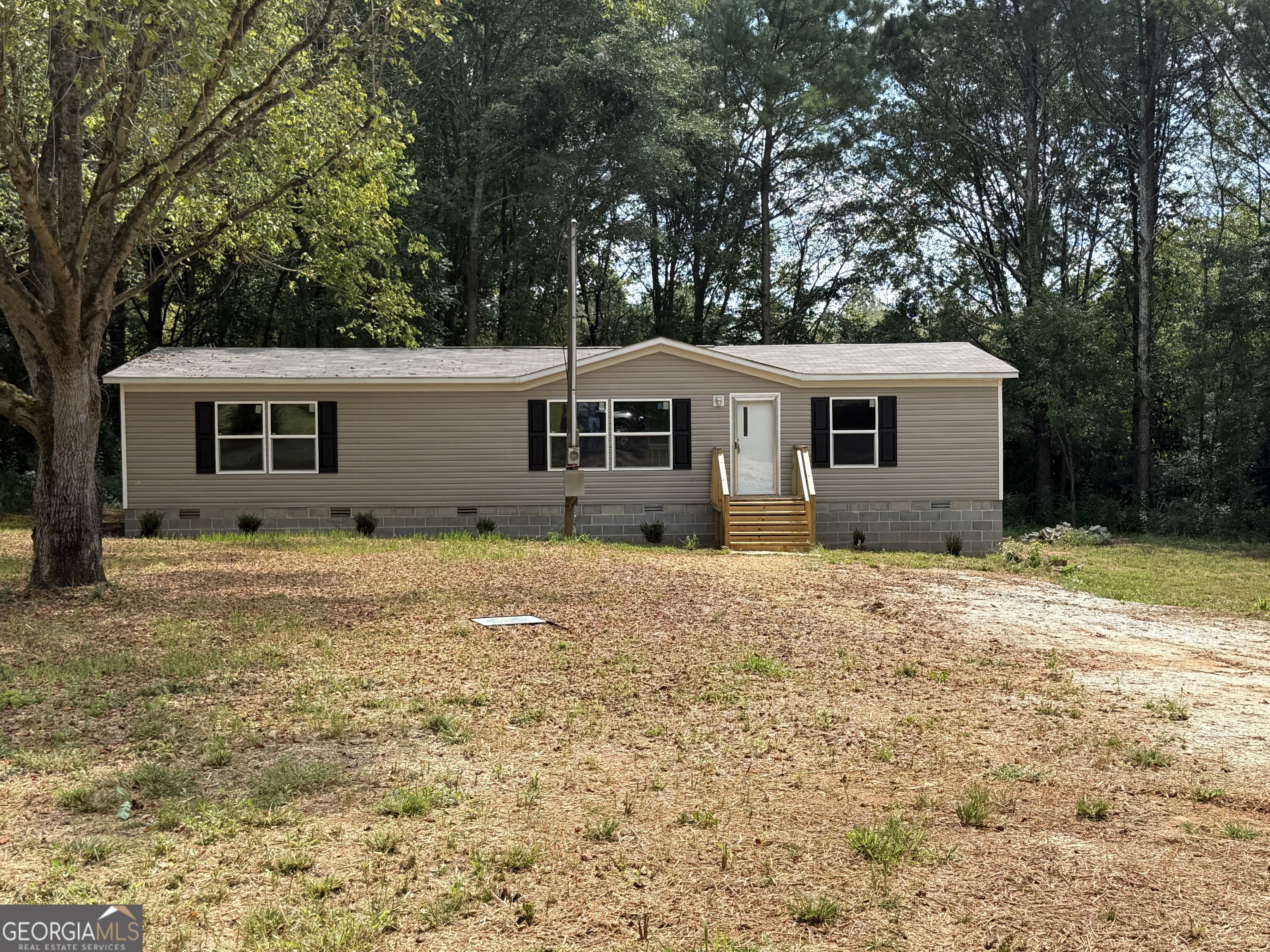 Beautiful New double wide on 1ac. 3 bedroom 2 full bathrooms, 1,475 SQ ft. All electric,On A quiet street.Just a short walk to Bowdon elementary school and Copeland Hall. This home qualifiers for FHA USDA and Va financing, Seller may assist with closing cost when using our preferred lender Call Listing Agent for More details.