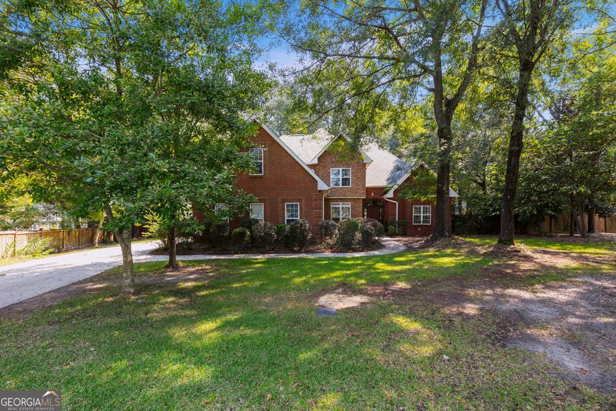Discover this all-brick home with New Roof and County Taxes ONLY nestled on a spacious .60 acre Culdesac lot in the highly sought-after Brantley Subdivision. Offering 4 bedrooms, 2.5 baths, and a heated and cooled sunroom(not included in sq footage) this home is designed for both comfort and elegance. Step into the grand living room, where beautiful New floors complement a magnificent custom stacked stone fireplace soaring from floor to ceiling that fills the room with warmth! The gourmet kitchen with stainless steel appliances, extra pantry and wine rack flows seamlessly into a relaxing sunroom, providing views of the expansive backyard with an oversized deck and hot tub, the perfect spot for morning coffee or entertaining guests. Retreat to the luxurious first-floor primary suite, featuring his and her closets, a jetted tub and dual vanities. Upstairs, you'll find three large bedrooms( one could be movie room/game room) and oversized full bath with a seperate vanity perfect for to girls get ready while others are brushing their teeth, offering plenty of space for all! Zoned for Houston County High and direct access to I-75, Hwy 96 and Hwy 41!