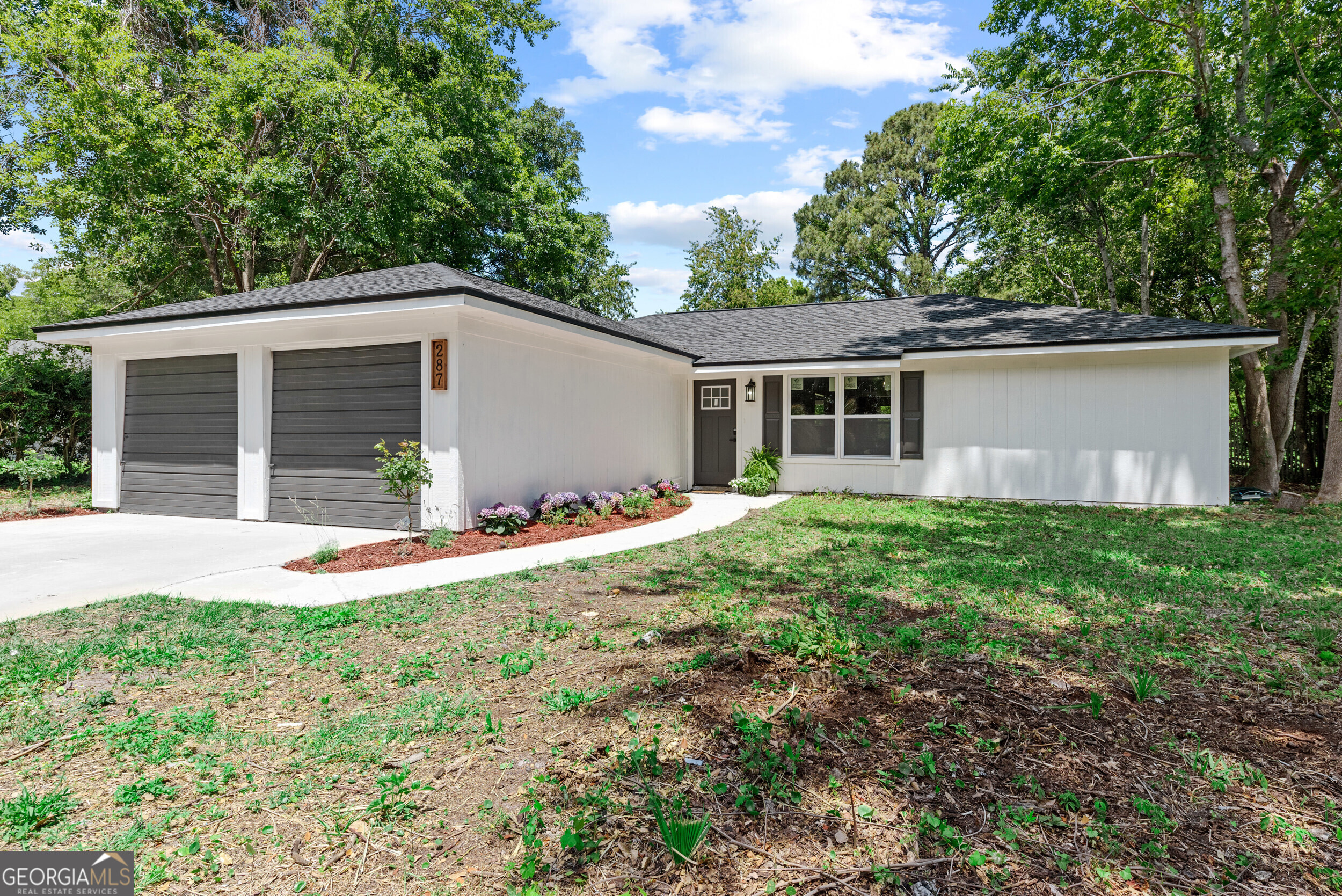 COMPLETELY REMODELED FARMHOUSE CHARMER! THIS BEAUTIFUL RENOVATED 3 BEDROOM, 2 BATH HOME, BOASTS 1522 SQFT OF STYLISH LIVING SPACE WITH MODERN UPDADES THROUGHOUT. NEW OWNERS WILL ALSO ENJOY HAVING PEACE OF MIND WITH A BRAND NEW ROOF, HVAC & WATER HEATER. THE STUNNING KITCHEN FEATURES BUTCHER BLOCK COUNTERTOPS AND BRAND NEW CABINETRY. SS APPLIANCES. A BONUS & FLEX SPACE OFFERS THE OPTION TO BE AN OFFICE, PLAYROOM OR ADDITIONAL LIVING SPACE. YOU WILL LOVE THE NEW LAMINATE FLOORING THROUGHOUT, FRESH INTERIOR & EXTERIOR PAINT, BEAUTIFUL NEW BATHROOM VANITIES & MORE! IN THE COOLER MONTHS, YOU CAN COZY UP BY THE "SHIPLAP" ACCENTED ELECTRIC FIREPLACE AND EMBRACE THE CHARM OF THIS FARMHOUSE INSPIRED GEM! CALL TO SCHEDULE SHOWING TODAY!
