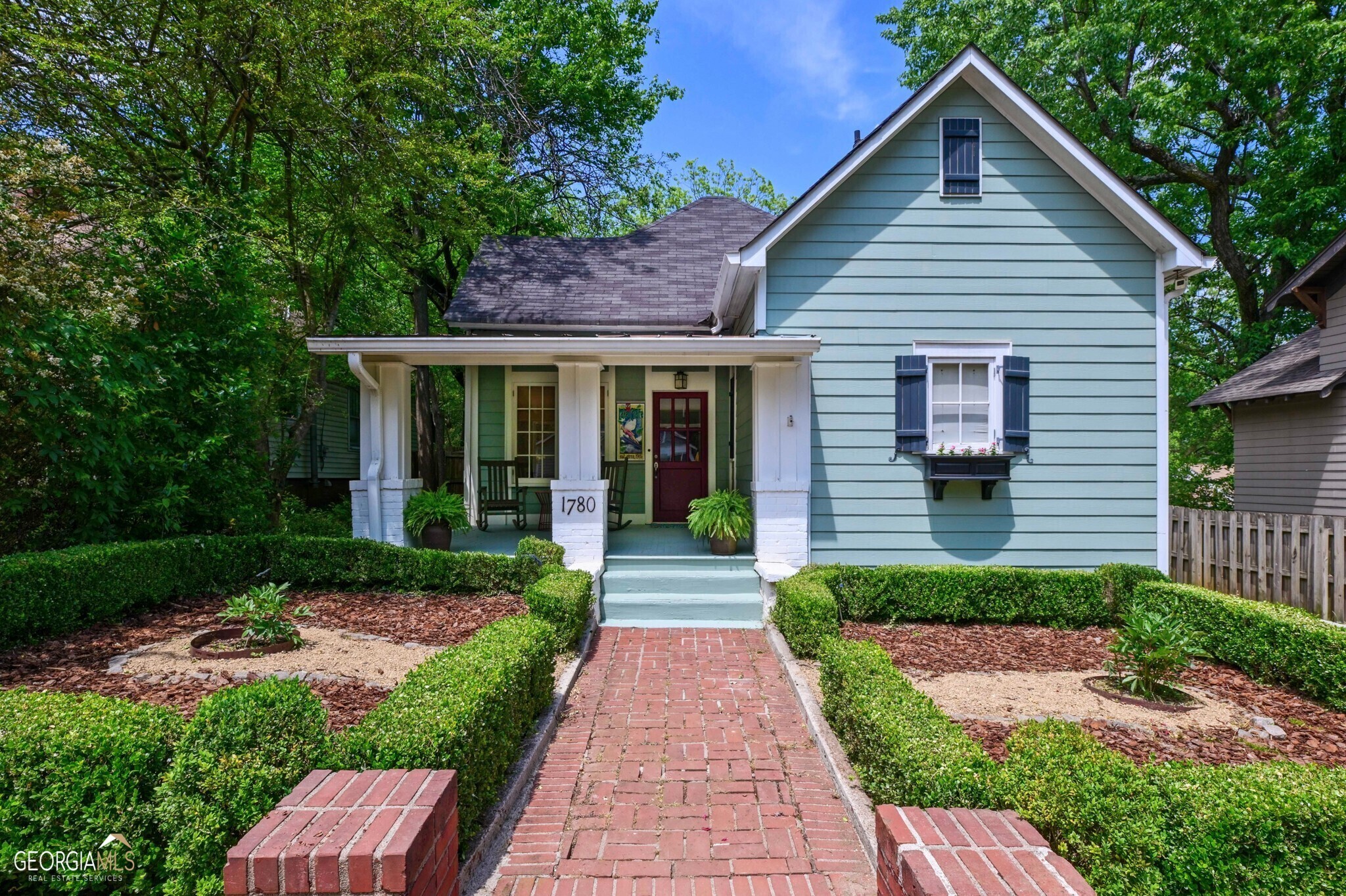 Coveted Bungalow in the Heart of Lake Claire! Only STEPS away from Candler Park, Pullman Yards, Great Schools, Local Restaurants, and more, this Stunning Home offers the perfect mix of Modern Convenience and Historic Charm. A Rocking Chair Front Porch welcomes you inside. Original Hardwood Floors flow from a light-filled Dining Room into a spacious Family Room. Stainless Steel Appliances shine in the bright Kitchen with a Vaulted Ceiling. Unwind in the Owner's Suite offering a Walk-In Closet and Spa-Style Ensuite with Dual Vanities and Tons of Storage. A Second Bedroom enjoys a Hall Bathroom. The Third Bedroom showcases Built-In Shelving, a Vaulted Ceiling with Skylights, and French Doors leading out to the Rear Deck - perfect for a Den or Home Office. Outside, a Rear Deck with Built-In Seating overlooks the Fully Fenced Backyard that's prime for Pets or Play. A Renovated Storage Shed is perfect for Additional Storage. A New Water Heater, HVAC, and Newly Poured Driveway welcome you home. Steps Away to Candler Park Market, Local Coffee Shops, Restaurants, Parks, Playgrounds, and Minutes to The BeltLine, Little Five Points, Inman Park, Kirkwood, and More with Easy Highway Access!
