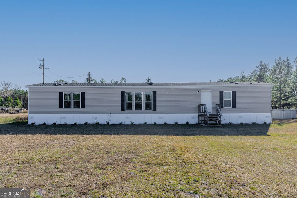 Photo of 877 Leland Smith Road, Homerville, GA 31634 (MLS # 10675156)