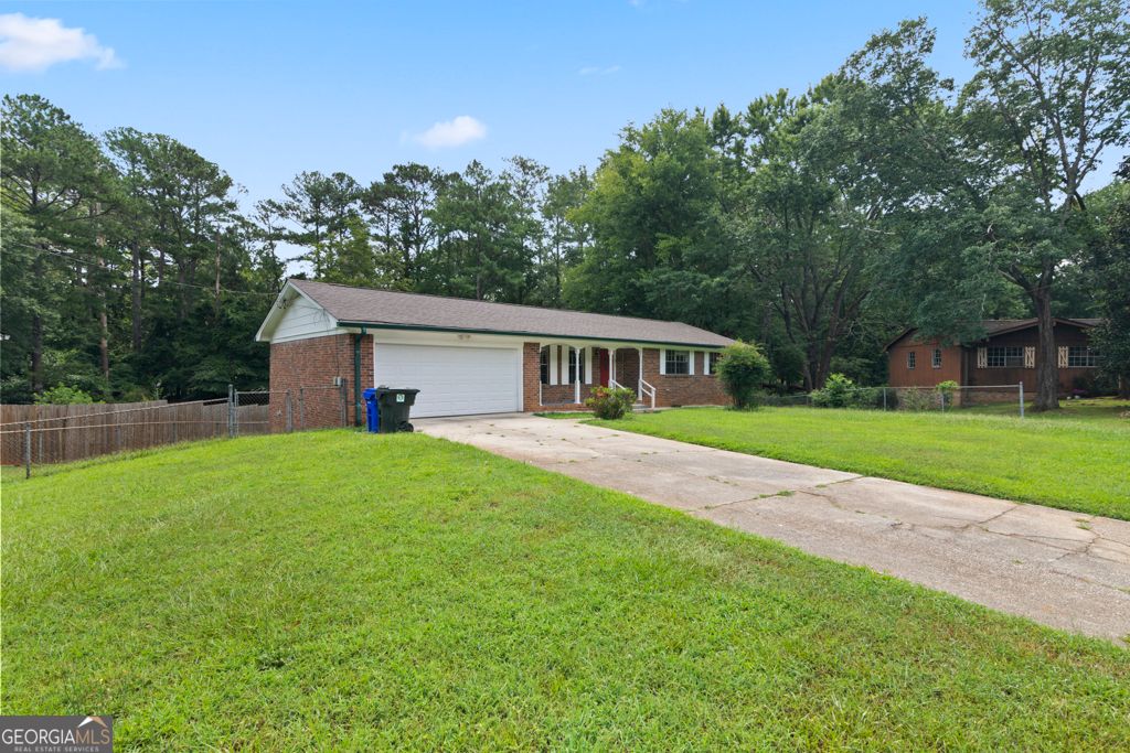 Photo of 1492 Tanglewood Way NW, Conyers, GA 30012 (MLS # 10631960)