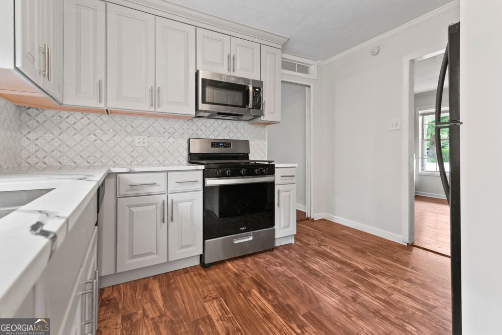 Photo of 1492 Tanglewood Way NW, Conyers, GA 30012 (MLS # 10631960)