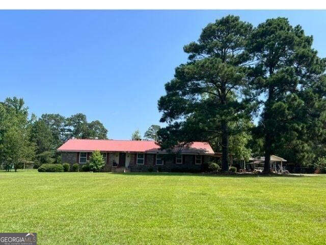 Photo of 319 Ed Carson Road, Americus, GA 31709 (MLS # 10849403)