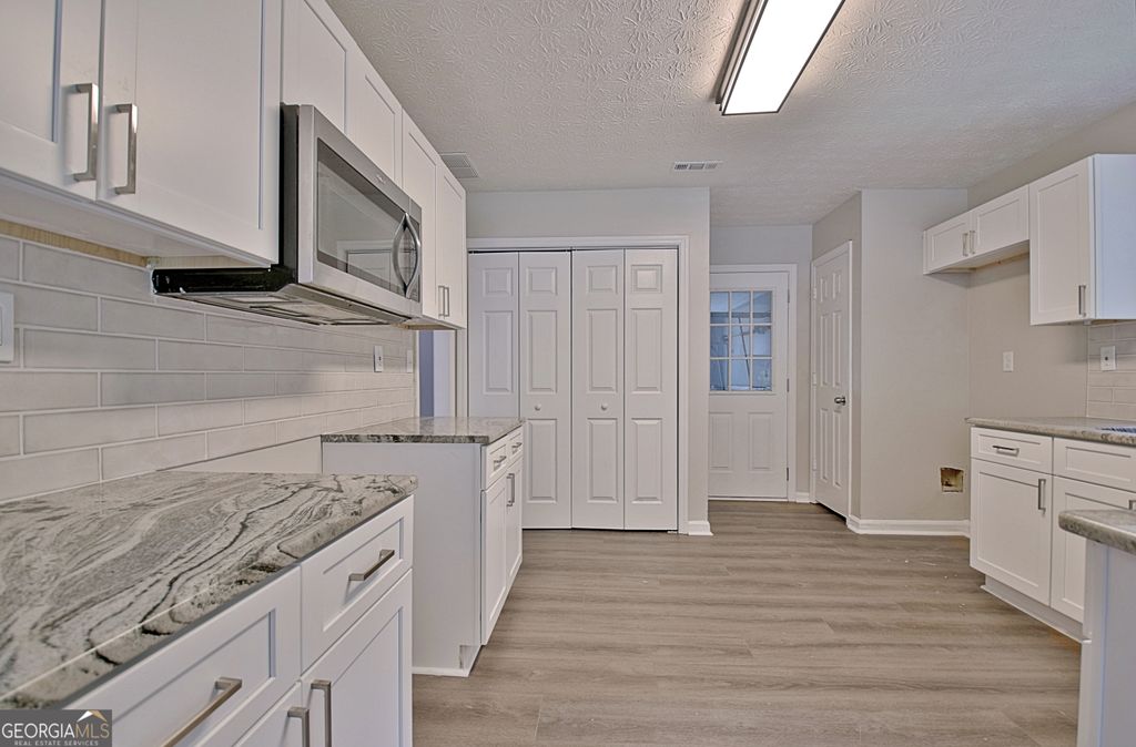 Photo of 85 Holly Springs Road, Sharpsburg, GA 30277 (MLS # 10696717)