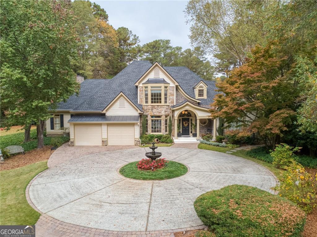 Comfortable Elegance in a Prime North Atlanta Location. Step into refined comfort at 125 Claridge Drive, where thoughtful design meets everyday comfort. Tucked away in a quiet cul-de-sac of just four homes, this beautifully updated residence blends classic design with modern functionality. With main-floor living, a spacious owner's suite, and plenty of room upstairs for guests, kids, or in-laws, the home adapts easily to any lifestyle. Whether you're hosting for the holidays or unwinding by the fire, you'll appreciate the timeless finishes and thoughtful updates throughout. And if you don't need all the space just yet? Energy-efficient spray foam insulation ensures your comfort without compromise. Highlights: * Main-Level Living: Spacious owner's suite with dual closets, fireplace, and a serene en-suite bath * Upstairs Retreat: Flexible space for kids, guests, or in-laws with efficiency-minded insulation * Chef's Kitchen: Miele appliances, gas cooktop, custom cabinetry, and a 150-bottle Viking wine fridge in a separate * Outdoor Living: Covered patio with limestone tile, gas grill + cooktop, stone fireplace, and custom lighting * Architectural Touches: Dramatic dome ceiling, custom vanities, built-in bookcases, and designer lighting * Warm Comfort: Two gas fireplaces are located throughout the home * Recent Upgrades: o 2024 architectural roof o Two 2024 A/C units o All bathrooms have been recently renovated with quartz, marble, and stone o High-efficiency attic insulation o Fresh interior and exterior paint * Bonus Features: Epoxy-sealed garage with extra storage, included Miele washer/dryer, and garage refrigerator * Exceptional Location: Brookhaven/Buckhead/Sandy Springs convenience with a lower tax base This home is more than just beautiful-it's livable, practical, and welcoming. Come see for yourself.