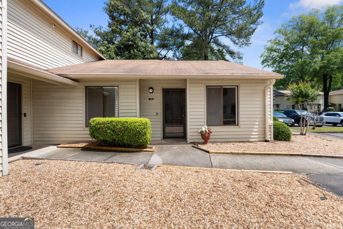 Your grand opportunity awaits, BACK on the MARKET! Freshly updated, lovingly maintained, and ready to welcome you home: 1104 Country Court is a rare gem in the heart of Lawrenceville! Enjoy true peace of mind with a well-run HOA covering water, trash, exterior building and ground maintenance, and access to a sparkling pool - all for a low monthly fee. Plus, the community offers access to a beautiful 20-acre lake and clubhouse, and the County Greenway, playground and park are right next door for endless outdoor enjoyment. This end-unit, one-level townhome has been meticulously cared for by its original owner, offering an inviting, sun-soaked layout that feels as good as it looks. The layout is effortless, the condition is impeccable, and the value is unbeatable! Perfectly positioned just minutes from Downtown Lawrenceville's buzzing shops and dining, steps from Club Drive Park, and major routes like 316 and Sugarloaf Parkway - everything you need is right at your fingertips. Exceptionally cared for, incredibly located, and offering extreme value - your next chapter starts here.