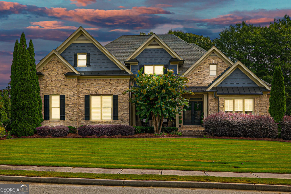 This elegant two-story brick home offers timeless curb appeal and a spacious floor plan designed for both everyday living and entertaining. Featuring 4 bedrooms, 3.5 baths and a bonus room this property blends comfort, style, and functionality. The main level showcases beautiful hardwood floors throughout the primary living areas, including a formal dining room, a welcoming great room, and a cozy keeping room just off the kitchen. The chef's kitchen is highlighted by custom cabinetry, abundant storage, and seamless flow into the living spaces making it perfect for hosting gatherings. The luxurious primary suite offers a true retreat with a private sitting area, an expansive walk-in closet, and a spa-inspired bath complete with a large tiled shower. Additional bedrooms are generously sized, each with access to private baths, offering plenty of space and privacy for family or guests. The full unfinished basement provides endless possibilities-whether you envision a home gym, media room, or additional living space. Step outside to a spacious back deck overlooking the private backyard, ideal for entertaining, grilling, or simply relaxing. Located in one of the area's most desirable developments, this home combines luxury, location, and potential!