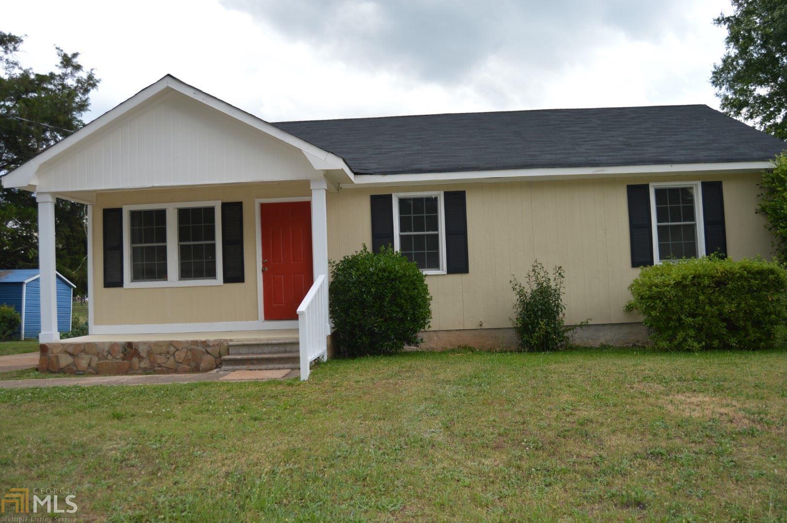 Awesome Investment or Perfect Starter Home! This super cute, 3BR, 2BA (Full bath added in Master BR) offers all NEW EVERYTHING...laminate, tile and carpet flooring; New paint, crown molding throughout; completely renovated Bathrooms and Kitchen. New Windows, Hot Water Heater, HVAC. The exterior offers a Rocking Chair front porch and spacious back yard that backs up to Evans Farms.