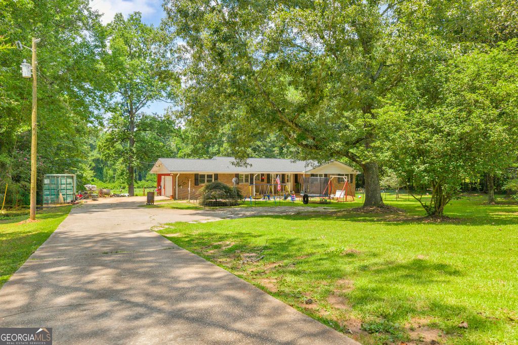 Photo of 849 Swan Lake Road, Stockbridge, GA 30281 (MLS # 10797188)