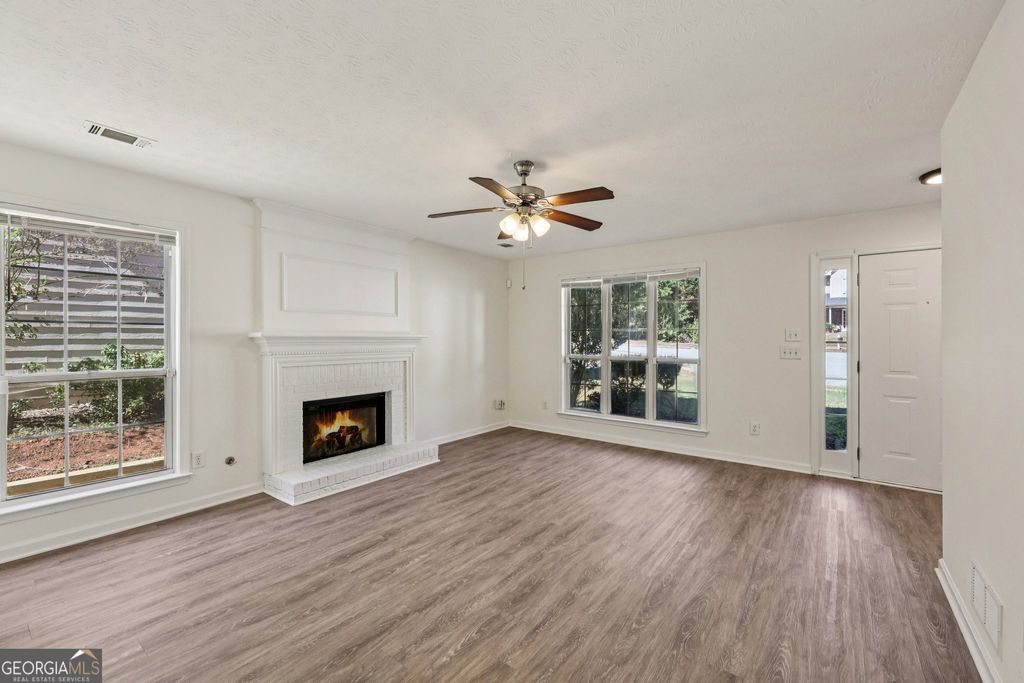 Photo of 390 Manor Glen Drive, Suwanee, GA 30024 (MLS # 10631300)