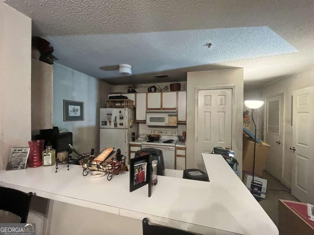 Photo of 1075 Peachtree Walk NE #A312, Atlanta, GA 30309 (MLS # 10757846)