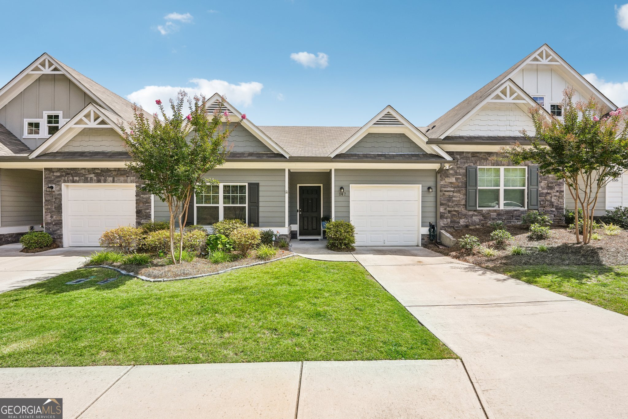 ONE LEVEL LIVING IN DESIREABLE 55+ COMMUNITY! This Augusta Floor Plan was previously a model home providing 2/2 split bedroom plan & one car garage. The Inviting foyer leads you to the Bright & Open Concept. Cozy great room provides access to the large screened back porch. Beautiful functional kitchen w/large island, granite, pantry and stainless-steel appliances. Oversized master ensuite features a double vanity, oversized shower w/niche and huge walk-in closet w/access to laundry room. Additional Bonuses include: Additional parking for guest is just across the street. This is an interior unit which maximizes efficiency costing less to heat & cool. Just a hop and skip to Hwy 515, Piedmont Hospital, Medical Offices and Also Very Convenient to shopping and dining. Call today to schedule an appointment to preview.
